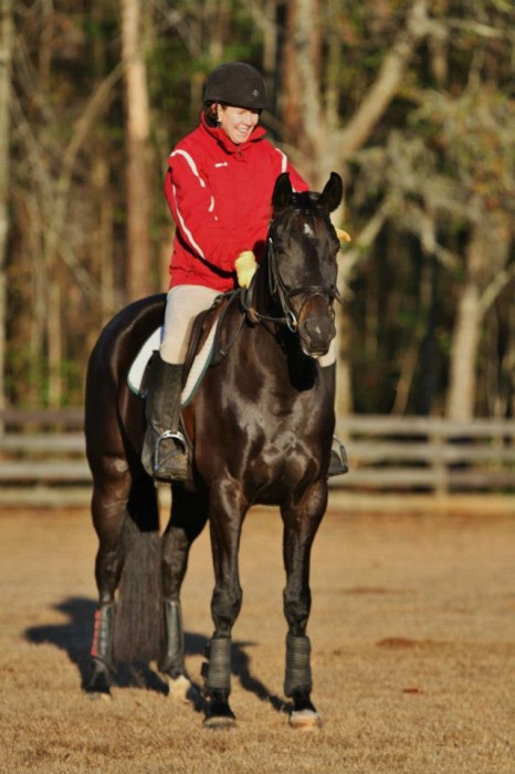 These days, Elizabeth Barron doesn't compete with "Cleo," but she still takes lessons and works on improvements at both jumping and dressage. Photo courtesy Elizabeth Barron.